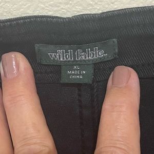 Cute black denim romper rough cut hem